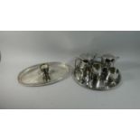 An Oval Silver Plated Gallery Tray Together Circular Tray Containing Stainless Steel Teawares