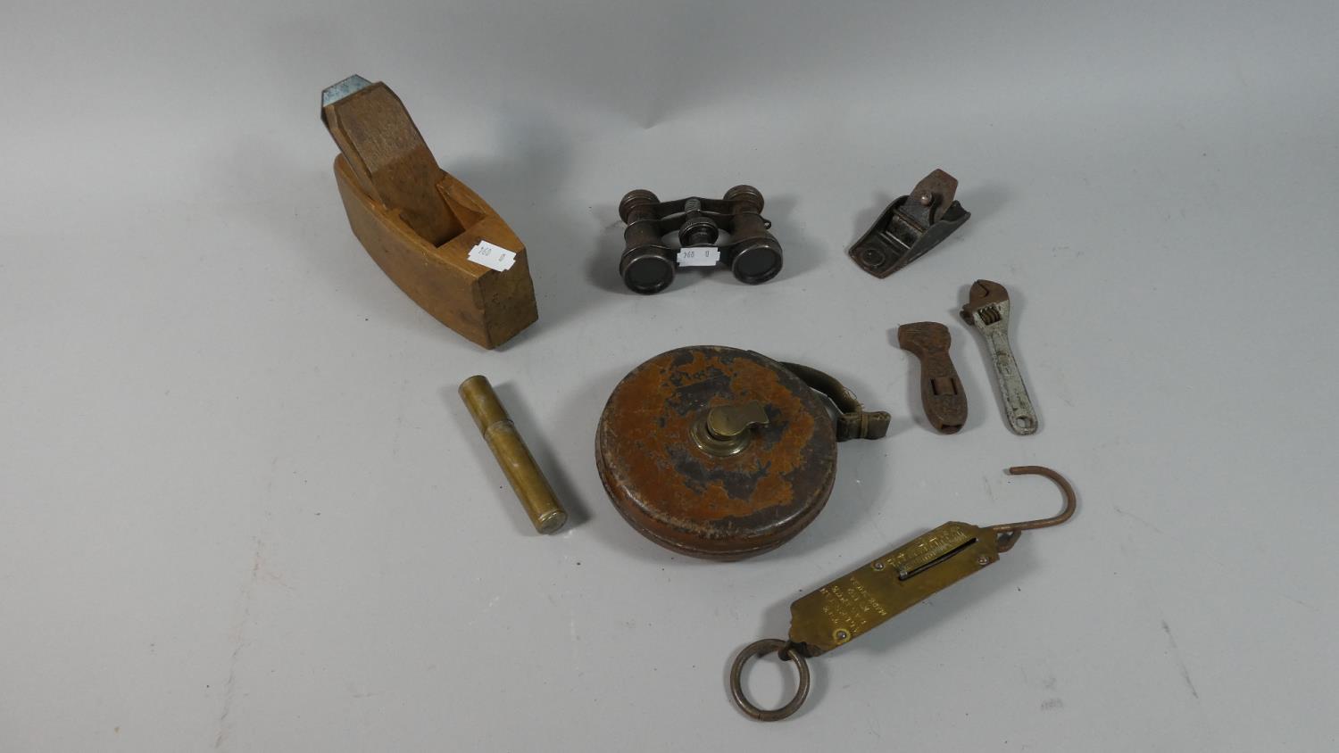 A Small Collection of Vintage Tools Including Thumb Plane, Tape Measure, Spring Balance Etc