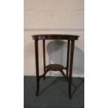 An Edwardian Circular Topped Occasional Table with Stretcher Shelf on Extended Cabriole Legs, 59cm