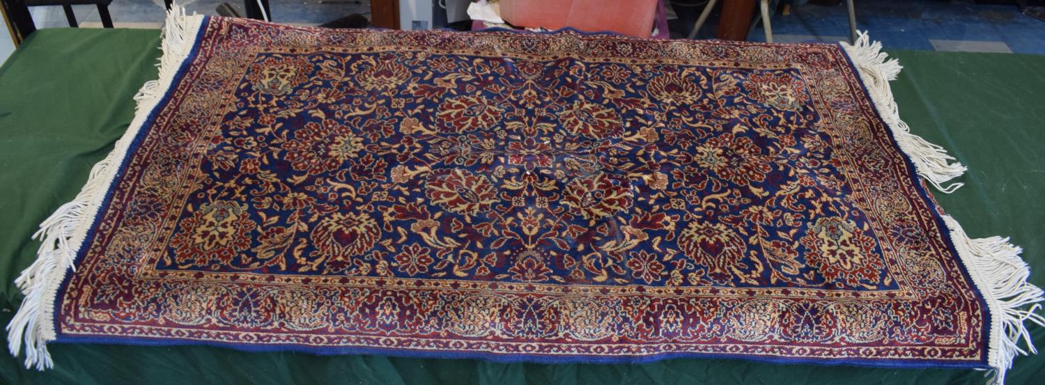 A Patterned Silk Rug, 125cm x 70cm