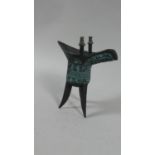 A Reproduction Chinese Bronze Libation Vessel Decorated in Relief, 14.5cm High