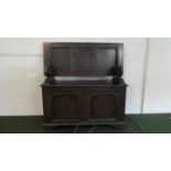 An Edwardian Oak Monks Bench with Hinged Three Panelled Back and Carved Lion Support, 95cm Wide