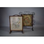 A Wrought Iron Tapestry Framed Fire Screen together with an Edwardian Embroidered Example.