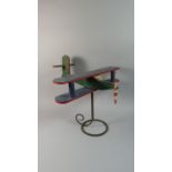 An Early 20th Century American Folk Art Aeroplane Whirligig, Polychrome Painted Wood, Supported on a