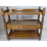 A Victorian Mahogany Three Tier Buffet with Turned Reeded Supports and Galleries Shelves. Two