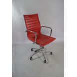 A Vintage Red Leather Charles Eames Style Swivel Desk Chair. 106cms High