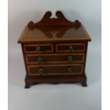 A Pretty Late 19th Century Crossbanded and String Inlaid Galleried Miniature Chest of Two Short