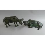 Two Green Patinated Chinese Bronze Studies of Standing and Reclining Water Buffalo. 24cms Long.