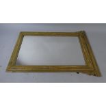 A Late 19th Century French Pier Mirror with an Original Distressed Gesso Finish. 112x80cms