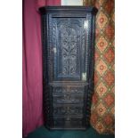 A 19th Century Country Oak Double Free Standing Corner Cabinet with Later Carving having Drawers