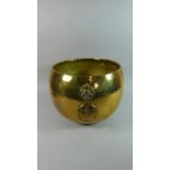 An Early to Mid 20th Century Hand Beaten Brass Planter with Three Ring Handles. 35cms Diameter.