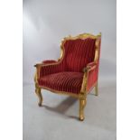 A 19th Century French Carved and Gilded Wing Arm Chair, Supported on Cabriole Legs. 89cms High