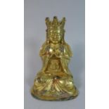 An Early Chinese Gilt Bronze Study of a Crowned Buddha. 18cms Tall