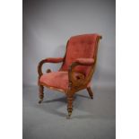 A Late Victorian Walnut Framed Ladies Scrolled Armchair with Button Upholstery.