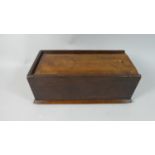 A 19th Century Birchwood Table Top Tinder Box with a Sliding Top Enclosing Two Compartments,