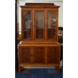 A Burr Yew Wood Glazed Display Cabinet in the Oriental Style with Three Doors to Shelved Base