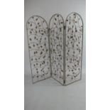 A French Three Fold Metal Screen decorated with Entwined Painted Metal Roses, Each Panel 50x50cms