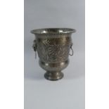 A Modern Metal Wine Cooler Bucket with Lion Mask Handles and Relief Floral Decoration to Body,