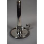 A Sheffield Plate Bed Chamber Stick with Sprung Pusher, on Circular Tray, 22cm High