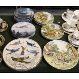 A Collection of Twenty-Four Various Decorated Plates to Include Dambusters, Guardians of the Sea,