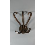 An Edwardian Bentwood Three Section Hat and Coat Hook, 33cm high