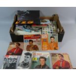A Box Containing Large Quantity of Various Elvis Presley Ephemera to Include 45rpm Records, Scrap