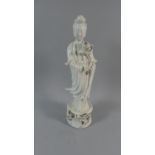 An Oriental Blanc De Chine Study of Guan Yin, 42cms High