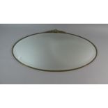 An Edwardian Oval Bevel Edged Wall Mirror, 68cms Wide