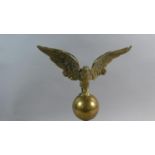 A Heavy Brass Eagle Clock Mount, 20cm high