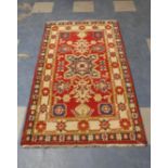 A Patterned Woollen Hearth Rug, 158x94cms