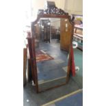 A Late Victorian Mahogany Framed Mirror with Carved and Pierced Pediment, 126cms High