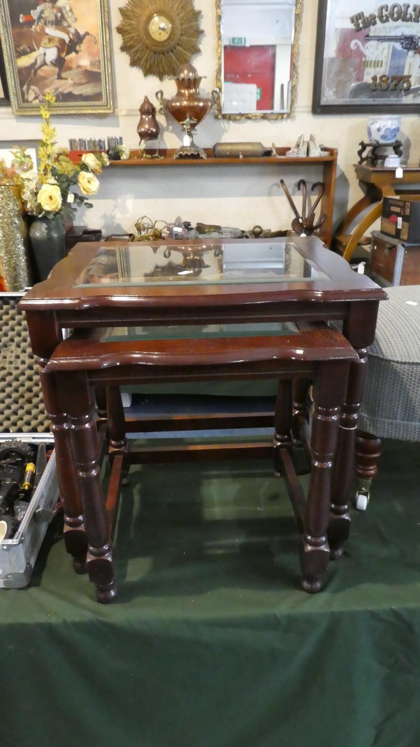 A Modern Nest of Two Glass Topped Tables