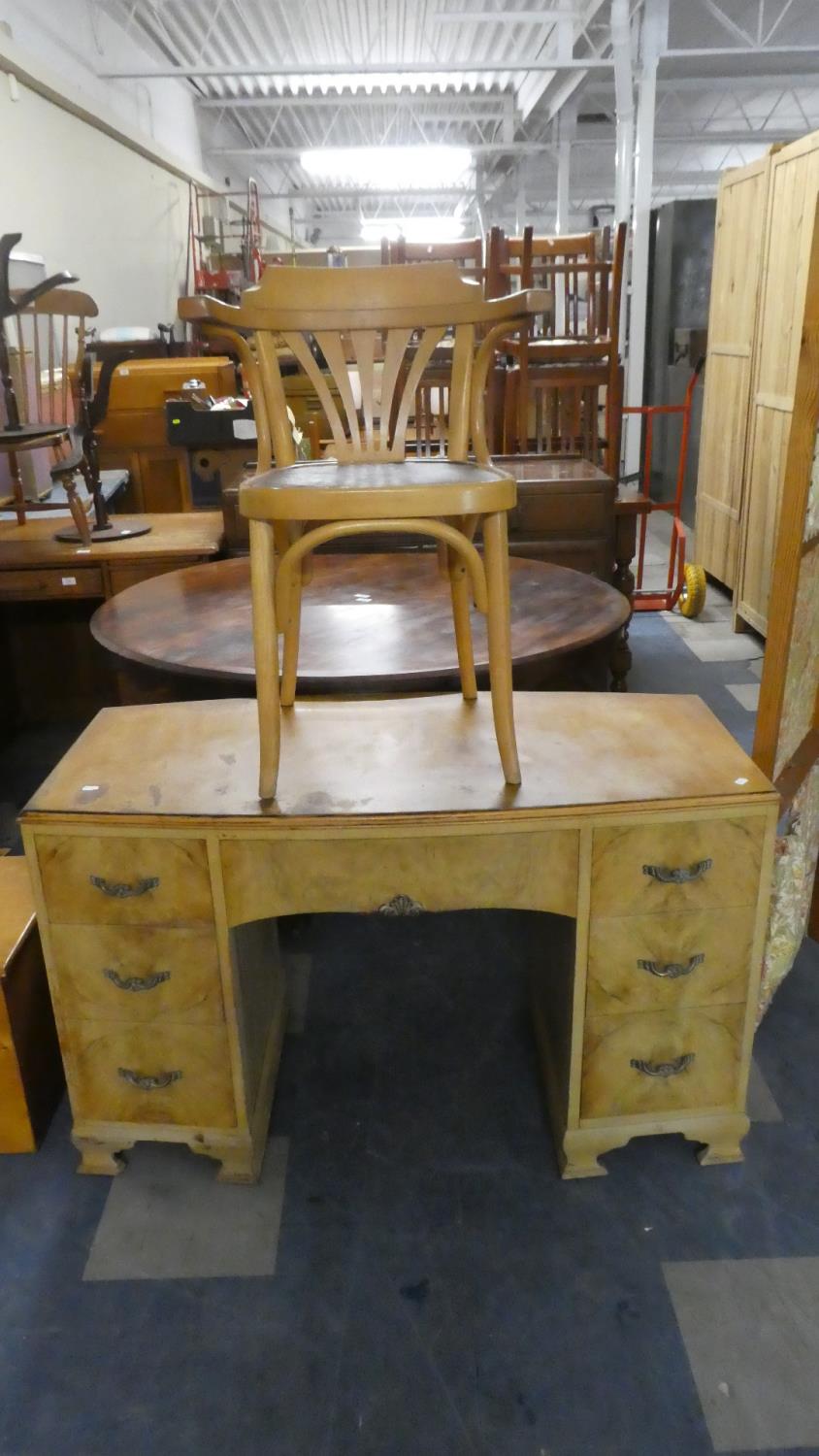 A Bow Fronted Satinwood Desk or Dressing Table together with Chair 115cms Wide