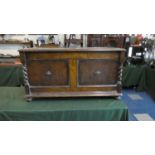 An Oak Two Panel Lift Top Coffer Chest, 105cms Wide