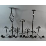 A Collection of Various Wrought Iron Candle Prickets and Wall Hanging Candle Stands