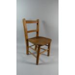 A Small Elm Seated Childs Chair
