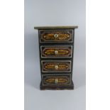 A Painted Four Drawer Spice Cabinet with Foliate Decoration, 39cm High