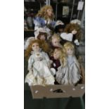 A Box of Modern Ceramic Head Dolls, Approximately 10