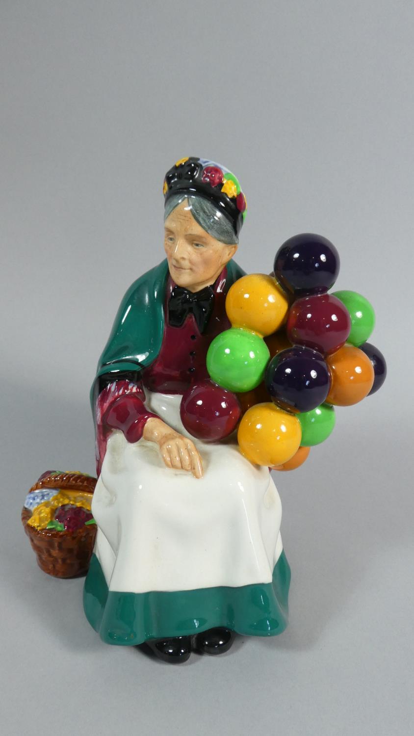 A Royal Doulton Figure, The Old Balloon Seller, HN1315