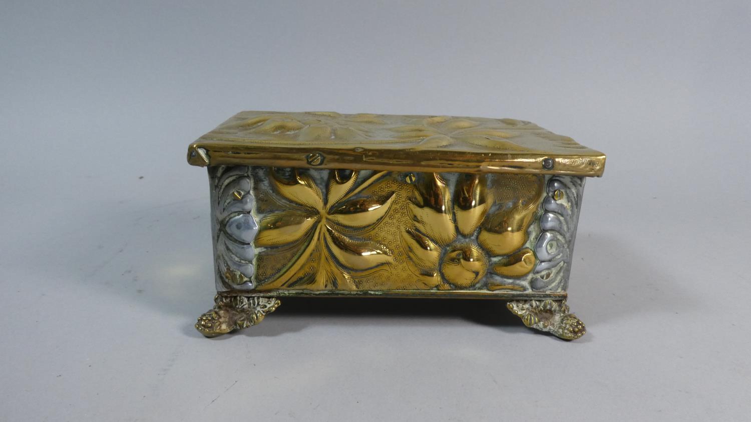 A Brass and Silver Plate Mounted Box with Foliate Decoration in Relief, 17.5cm Wide