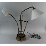 A Modern Adjustable Work Lamp with Magnifying Glass and Bull Dog Clip