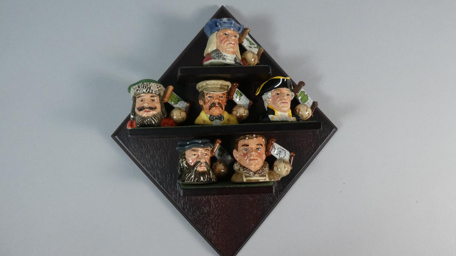 A Royal Doulton Explorer Tinies Collection with Wall Hanging Stand