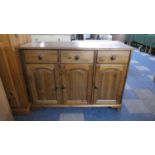 A Pine Three Drawer Sideboard with Cupboards Under, 19cm Wide
