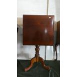 A Mahogany Rectangular Snap Top Tripod Table, 71.5cm High