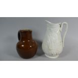 A Stoneware Glazed 'Take Courage' Pub Jug, 15cm High Together with a Moulded Pittcher with Harvest
