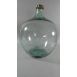 A Large Green Glass Carboy, 58cm high