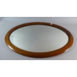 An Edwardian Oval Wall Mirror with Inlaid Mahogany Frame, 75cm Wide