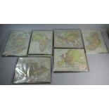 A Collection of Six Cut Out Puzzle Maps Including Africa, Europe, Ireland, Scotland and Asia by