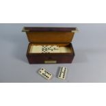 A Contemporary Set of Ivorine Dominoes Set in Leather Inscribed Keith, 19.5cm Wide