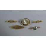 A Collection of 9ct Gold and Yellow Metal Brooches, 15.9g